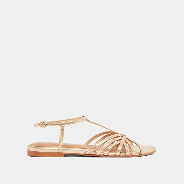 Strapped sandals in gold metallic leather